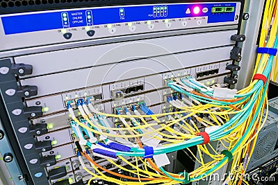 A backbone network router with many optical links is located in the server room of the data center. High-speed internet connection Stock Photo