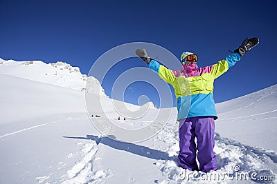 Backcountry snowboarder hiking to summit Stock Photo