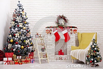 Backdrop interior room decorated in Christmas style with Christmas tree and gift boxes Stock Photo