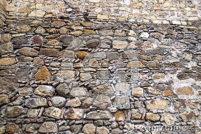 Background of ancient masonry wall of the fortified Ananuri castle Stock Photo