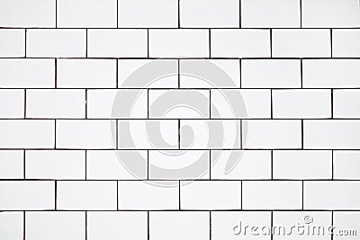 Background for a bathroom, a toilet from a classic white ceramic tile Stock Photo
