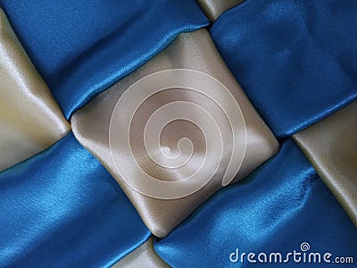 The background is beige, blue, dense, wicker, satin, cubed, square, shiny, beautiful bright background Stock Photo