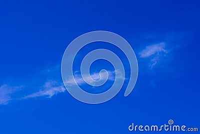 Background of a blue sky and a small cloud Stock Photo