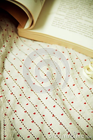 Background with a book and a fabric Stock Photo