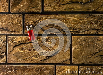 A set of all-different objects for photographic purposes against the background of a brick wall in close-up. Stock Photo