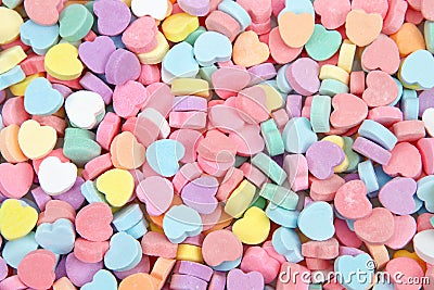 Background of brightly colored candy hearts for Valentine`s Day Stock Photo