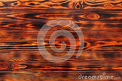 Burnt pine boards painted like mahogany Stock Photo