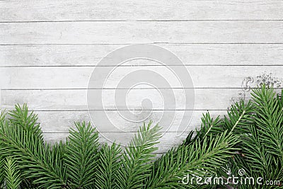 Background for christmas and new year, branches of spruce lie on a wooden background, space for text, festive background Stock Photo