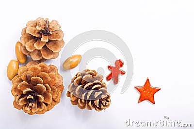 Background Christmas and New year Concept Pine cones and nuts with ceramic decoration Stock Photo