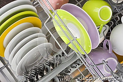 Background of clean dishes in dishwashing machine, top view Stock Photo