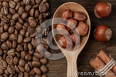 Background coffee. Roasted coffee, hazelnut, cinnamon Stock Photo