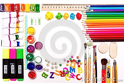 The background of color paints, pencils, brushes Stock Photo