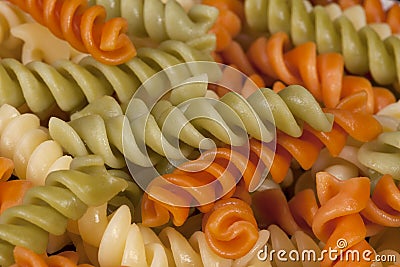 Background of colored spiral pasta , close-up Stock Photo