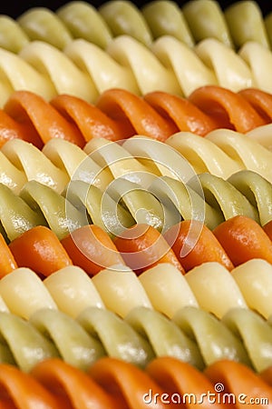 Background of colored spiral pasta , pattern Stock Photo