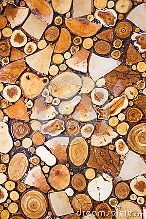 The background is composed of texture sections of different wood. Stock Photo