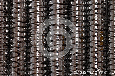Background created by glossy chrome plated shower hoses Stock Photo