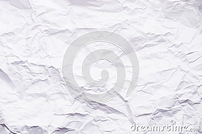 Background of crumpled paper. Close-up of a sheet of white, crumpled, uneven paper. Abstract texture background, copy space Stock Photo