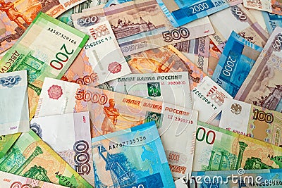 Background of different russian rubles banknotes, one million cash money. Top view of many scattered banknotes ruble Stock Photo