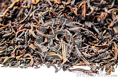 Background of dry black tea with flavors Stock Photo