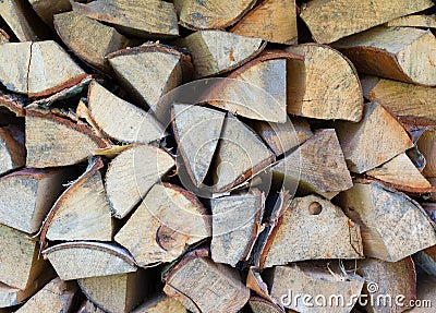 Background of dry chopped firewood logs Stock Photo