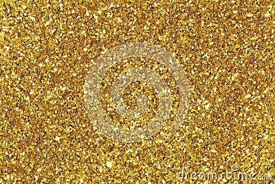 Background filled with shiny gold glitter. Stock Photo