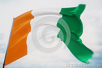 Waving flags of the world - flag of Cote Ivoire. Shot with a shallow depth of field, selective focus. 3D illustration. Stock Photo