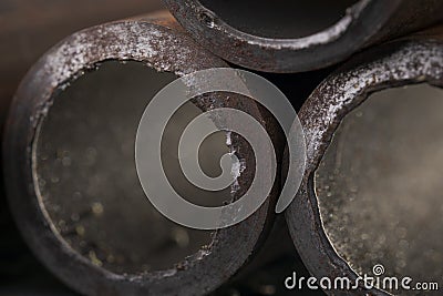 Background of fragments of rusted metal pipes Stock Photo