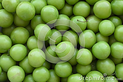 Background fruit image created with green plum Stock Photo