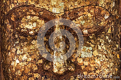 Background of Gilding to cover image Buddha with Shiny yellow leaf gold foil to face of Buddha statue that Buddhist show to Stock Photo