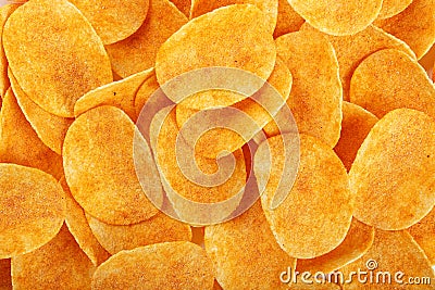 Background golden chips with texture. Stock Photo