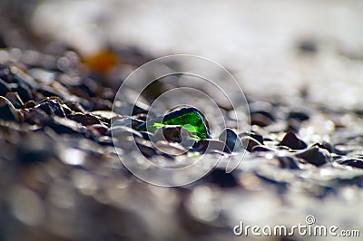 Background with a green shard of glass in the center Stock Photo