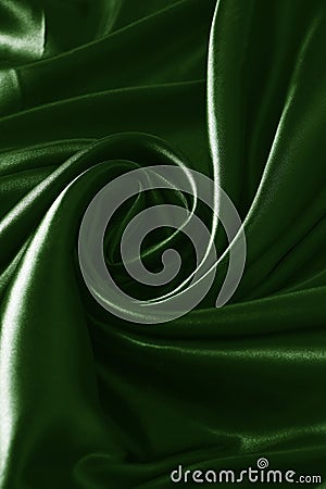 Background green twisted silk fabric,abstract texture satin fabric. Stock Photo