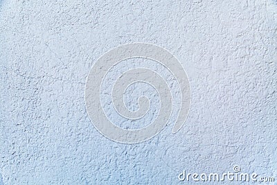 Background of grey painted embossed wall with cracked rough finish. Stock Photo