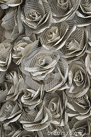 Flower blossoms folded from book pages Stock Photo