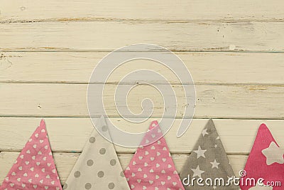 Background image, colored fabric flaps on a white wooden background. Stock Photo