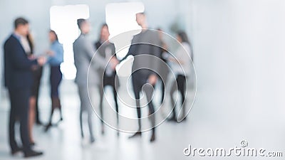 Background image of a group of corporate employees in the office lobby Stock Photo