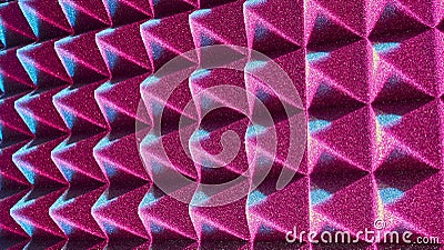 Background image of recording studio sound dampening acoustical foam. red light Stock Photo