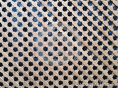 Arabic pattern wooden screen in Alcazar de Sevilla Stock Photo