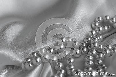 Wave satin fabric with necklace Stock Photo