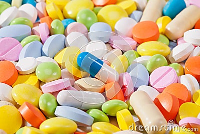 Background of large amount of colorful pills Stock Photo