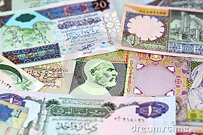 Background of Libyan money dinars banknotes with portraits of Omar Al-Mukhtar on some banknotes Stock Photo