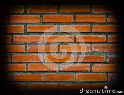 Background looks like a rectangular fragment of brick wall with a vignette. Detail of architecture and temporary building Stock Photo