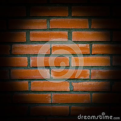 Background looks like a square fragment of brick wall with a vignette. Details of architecture and temporary building structures Stock Photo