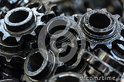 Background made of black spur gears or cogwheels Stock Photo