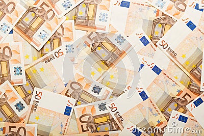 Background made of scattered euro bills 50 fifty banknotes. Money, business, finance, saving, banking concept. Exchange Rates Stock Photo
