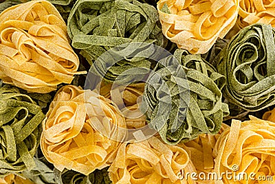 Background made up of balls of fettuccini pasta Stock Photo