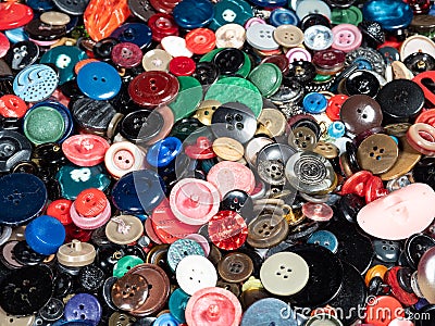 Background from many different used buttons Stock Photo