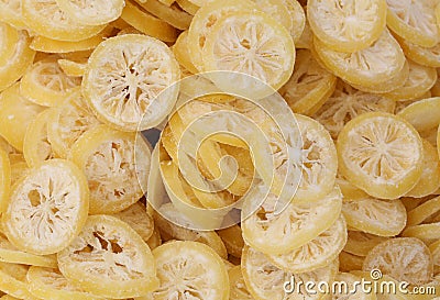 Background of many slices of dried lemons Stock Photo