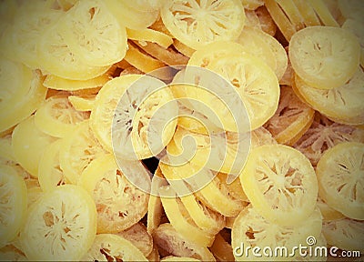 Background of many slices of dried lemons Stock Photo