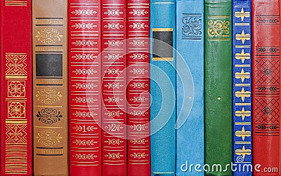 Background from multi-colored bindings of books Stock Photo